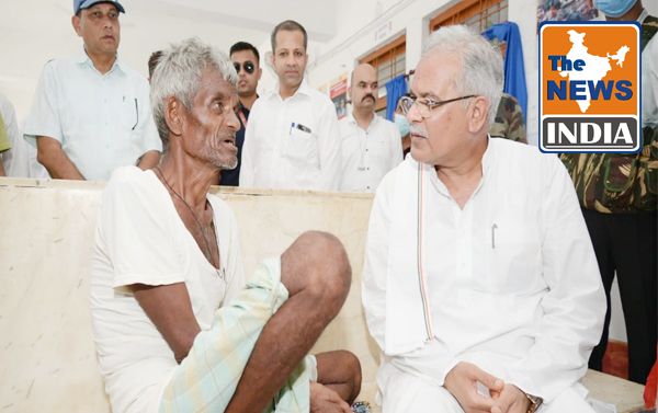 Chief Minister sat beside an elderly patient and affectionately asked about his health and well-being